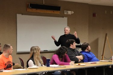 Mark Cushman of Giotto Enterprises speaks to Herkimer College students