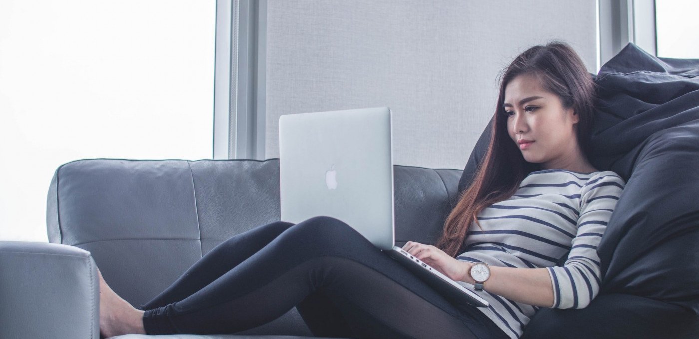 girl on laptop stock